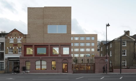 Hackney New School from the street, showing ornamental fragments from the old wharf.