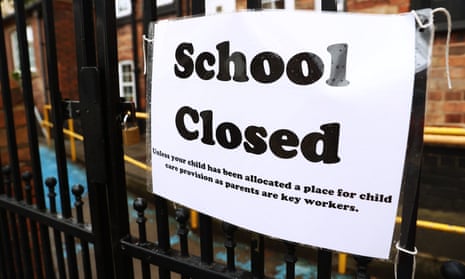 A sign is seen outside a closed school