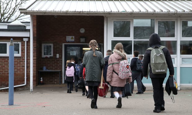 Children arriving at a school.
