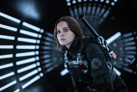 She creeps pensively down a dimly lit tunnel