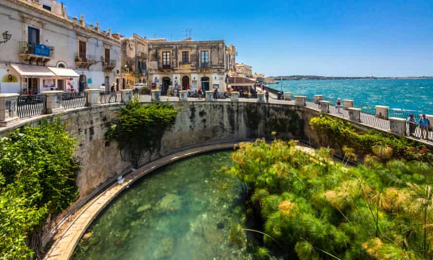 Southern comforts: escape the snow and ice with a long train ride across Europe ending it Siracuse in Sicily.