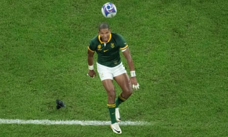 South Africa's fly-half Manie Libbok watches the ball after taking a penalty kick during the 2023 Rugby World Cup semi-final match between England and South Africa.