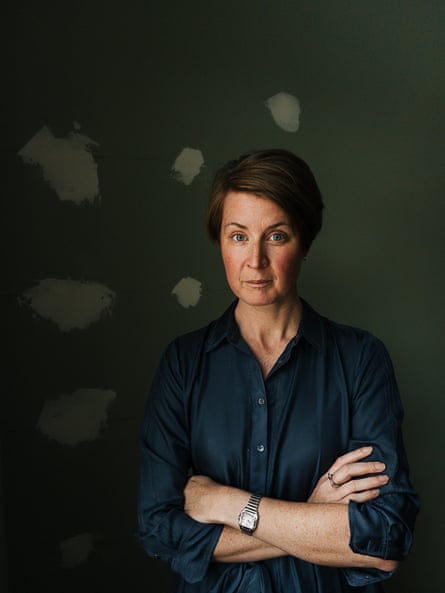 Leanne ten Brinke wearing a dark shift looking at the camera