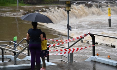 Flood waters inundate the Parramatta Ferry jetty on  in Sydney on Tuesday as a torrential downpour hit the city and other parts of NSW with the rain expected to last throughout the week.