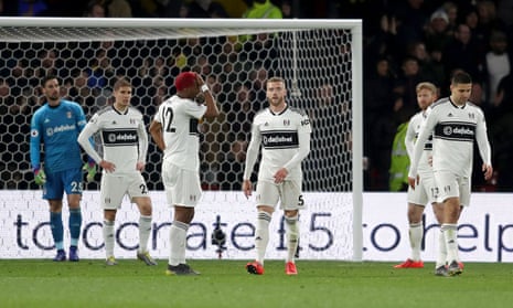Fulham players look dejected after Will Hughes’ goal.