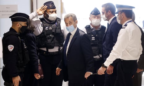 Nicolas Sarkozy, the former French president, arrives at court for his trial on corruption charges on 1 March.