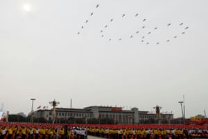 Chinese Communist Party 100th anniversary: Xi Jinping vows China will never be bullied – live updates 1 Participants wave flags as military aircraft fly in formation at the event marking the 100th founding anniversary of the Communist Party of China