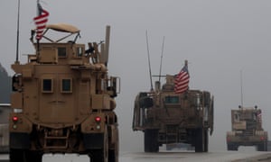 US military vehicles in Syria’s northern city of Manbij on Sunday. 3648.jpg?width=300&quality=85&auto=forma