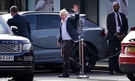 Boris Johnson waves
