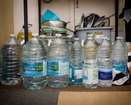 Water bottles stored in the flat, ready for the next outage.