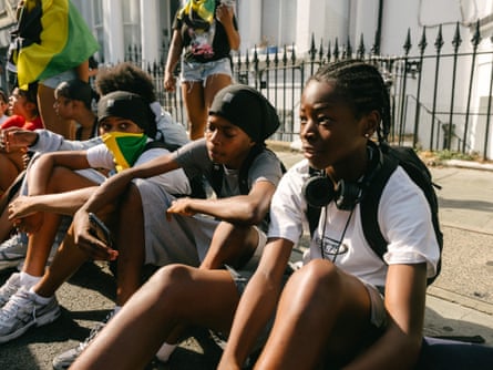 A group of young friends take a breather from the action.