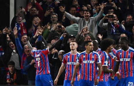 Crystal Palace's Ismaila Sarr celebrates in front of the fans