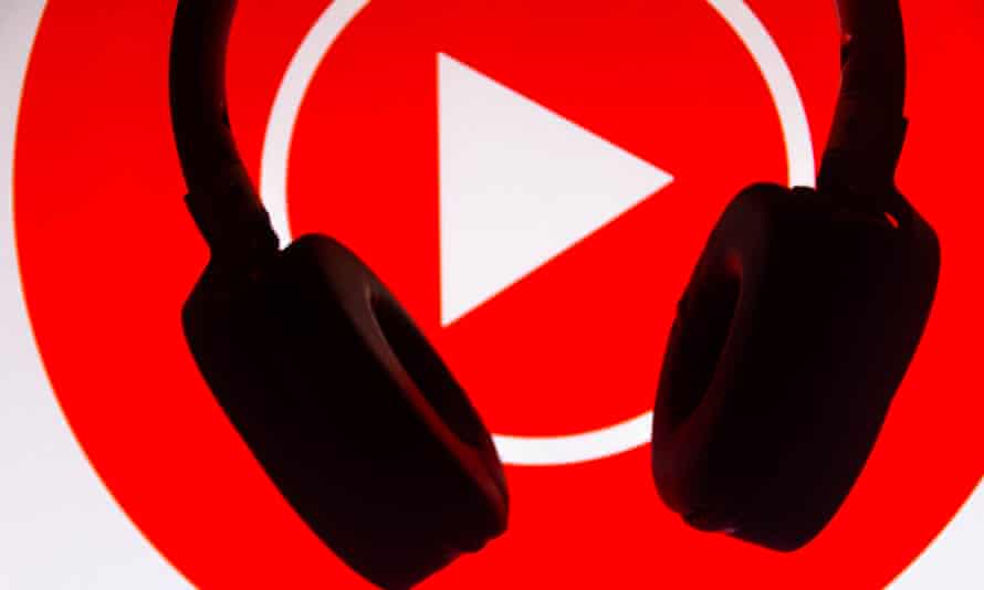 Sound App illustrations in Brazil - 6 Jul 2021Mandatory Credit: Photo by Rafael Henrique/SOPA Images/REX/Shutterstock (12198977h) In this photo illustration the YouTube Music logo is displayed along with the headset. It is a music streaming platform developed by YouTube. Sound App illustrations in Brazil - 6 Jul 2021