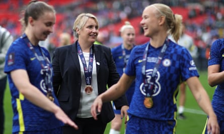 Chelsea manager Emma Hayes celebrates with players after the side’s victory in this year’s FA Cup
