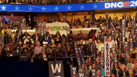 Protesters call for Gaza ceasefire during Biden's speech as some are detained outside – video