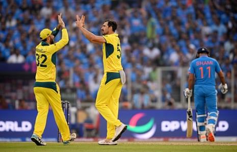 Mitchell Starc of Australia celebrates the wicket of Mohammed Shami