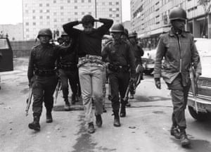 Mexican army troops escort arrested demonstrators during the 1968 massacre of Tlatelolco.