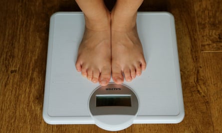 Feet on a weighing scale