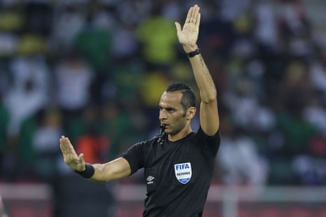 Algerian referee Mustapha Ghorbal leads today's team of match officials.