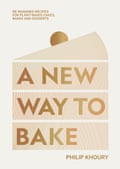 Front cover of cookbook titled ‘A New Way to Bake’ featuring an illustration of a slice of layered cake with a cherry on top