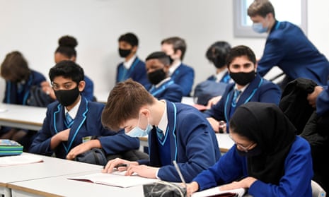 Year 9 students at Harris Academy Sutton wear face masks during a lesson in March 2021. 