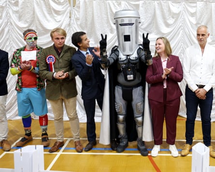 Count Binface, waits with other candidates for the declaration of the Clacton-on-Sea byelection at Clacton Leisure Centre