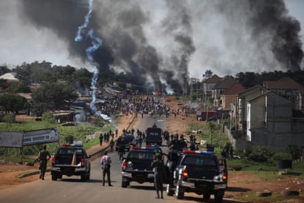 Nigerian police fire teargas during clashes in Abuja, October 2020, following demonstrations against police brutality.
