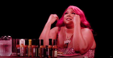 Lizzo tastes her way through a variety of hot sauces