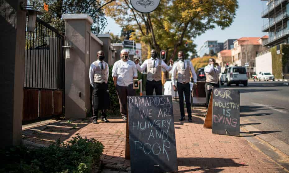 Workers of a restaurant in Johannesburg demonstrate against the Covid-19 lockdown