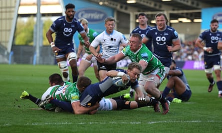 Gus Warr fights for the line to score Sale’s opening try against Leicester
