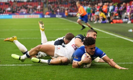 Siteni Taukamo of Greece goes over to score his sides first try.