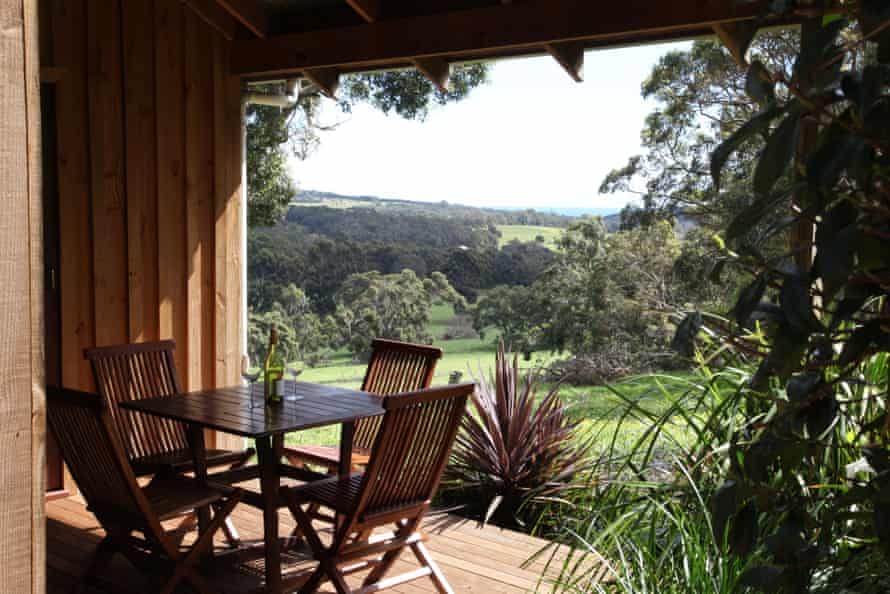 Terrace of a chalet overlooking a serene valley