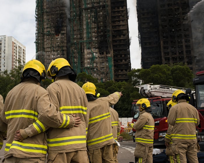 Rescue efforts end at Hong Kong tower block fire as death toll reaches 128