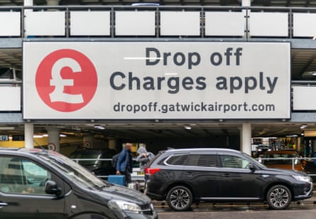 Drop off charges apply sign at Gatwick airport, England
