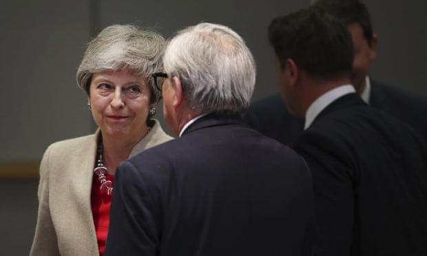 Theresa May with Jean-Claude Juncker at the EU summit in Brussels.