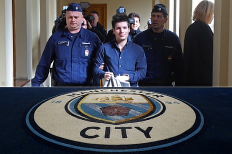 Rui Pinto being taken to court by police in Budapest in 2019