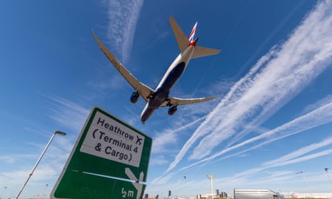 British Airways jet airliner plane landing at London Heathrow Airport in Hounslow, London, UK