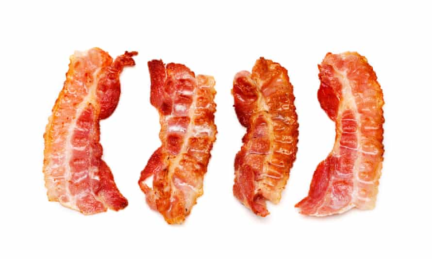 Slices of bacon on a white background.