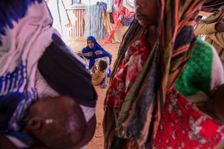 Khadro Abdullah with other mothers and their children at the Degaan IDP Camp in the Galmudug region, Galkayo.
