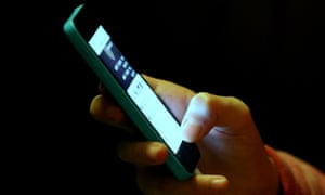 A mobile phone being used