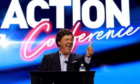 carlson smiles and does a thumbs-up