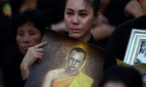 Mourners wait for the start of the funeral procession.