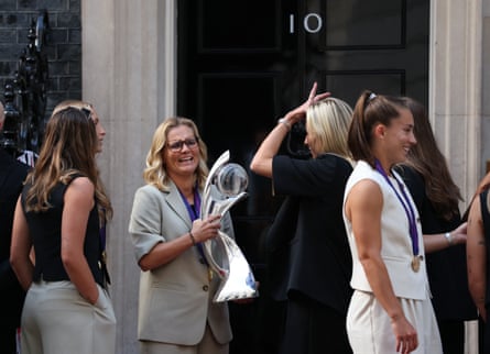 Sarina Wiegman holds the European Championship trophy as England arrive for their celebratory visit to 10 Downing Street