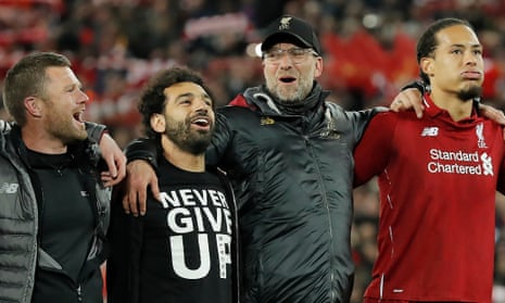 Liverpool v Barcelona<br>Jurgen Klopp sings “You’ll Never Walk Alone” in front of the Kop next to Mo Salah and Virgil van Dijk after the Liverpool victory during the Liverpool v Barcelona UEFA Champions League semi-final 2nd leg match at Anfield on May 7th 2019 in Liverpool (Photo by Tom Jenkins)