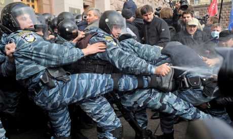 Activists of Ukrainian opposition parties clash with riot police in Kyiv, Ukraine October 2013