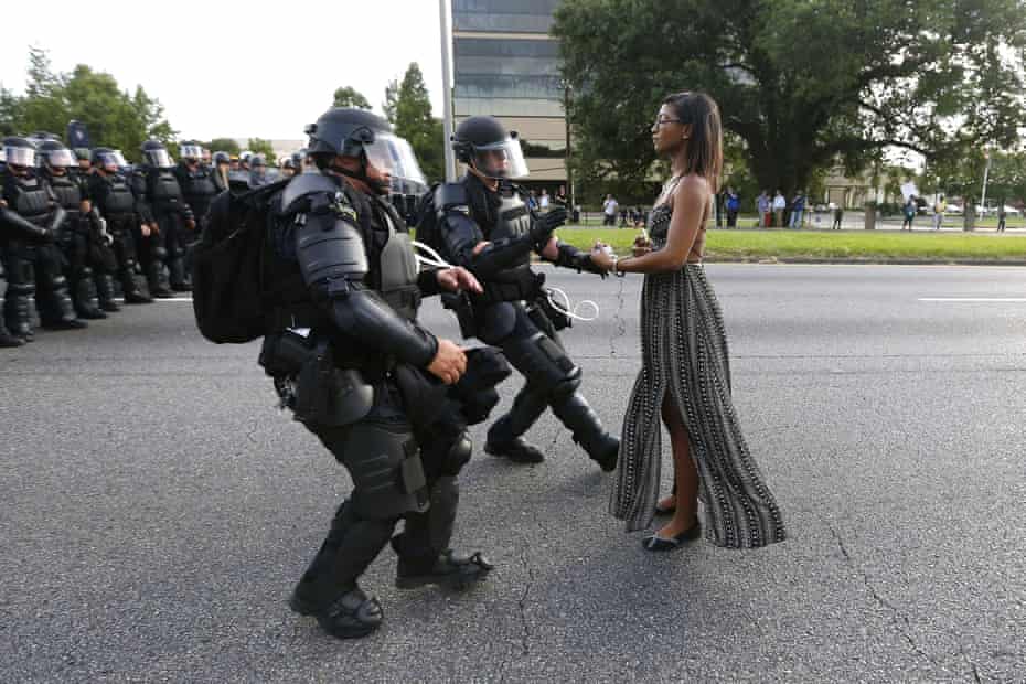 A demonstrator protesting the death of Alton Sterling, shot dead by police, is detained by law enforcement in Baton Rouge, Louisiana, US. 9 July 2016