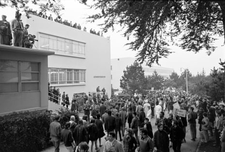 students protesting outside of a university building