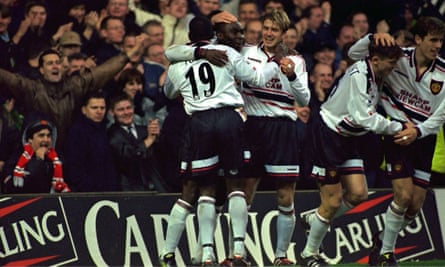 Andrew Cole celebrates after scoring Manchester United’s third goal in an 8-1 win at Nottingham Forest.