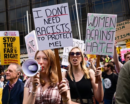 Protesters with Stand Up to Racism and other placards gather for a counter demonstration in Portsmouth on Saturday.