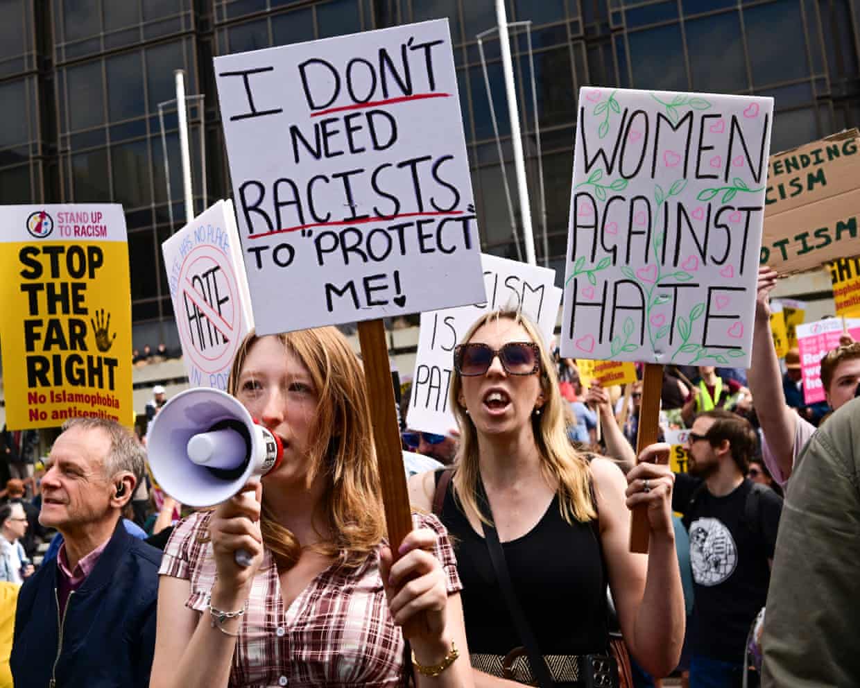 Protesters with Stand Up to Racism and other placards gather for a counter demonstration in Portsmouth on Saturday.